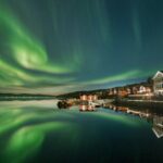 Das Malangen Resort am Fjord unter Nordlichtern © Malangen Resort